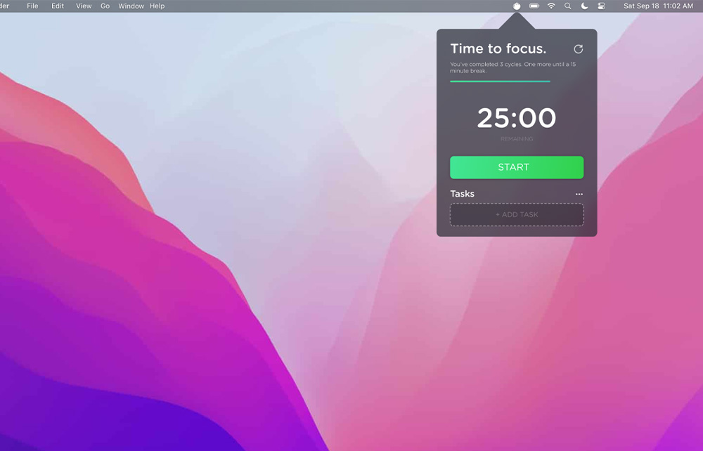 A task timer application on a Mac laptop