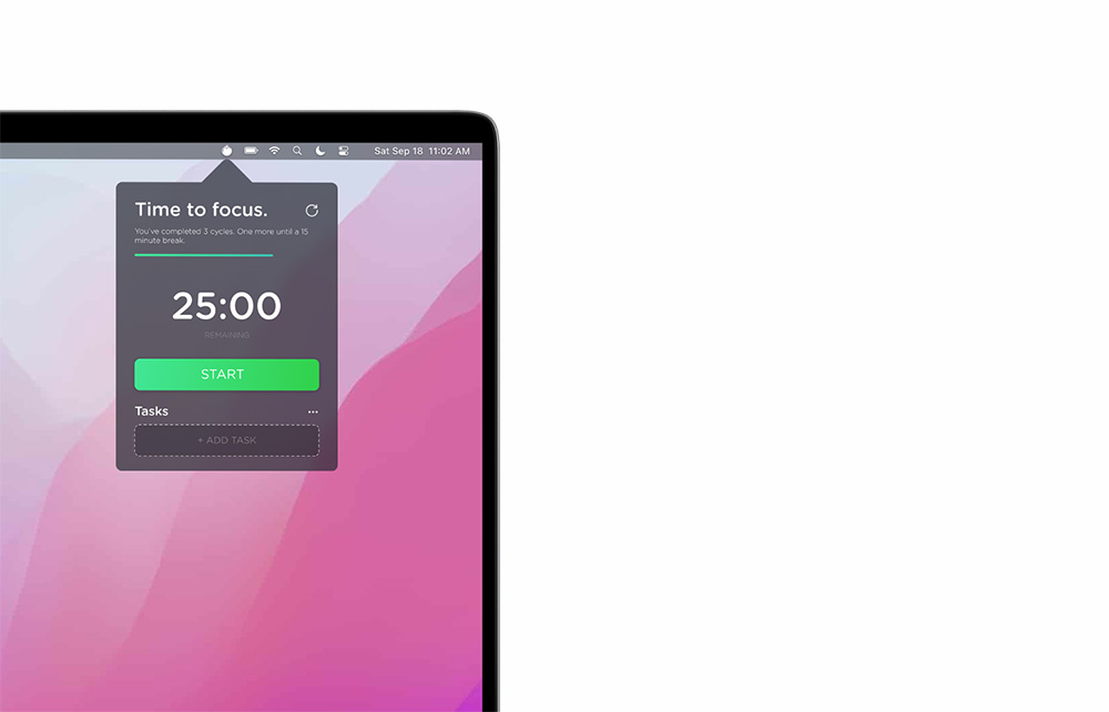 A task timer application on a Mac laptop